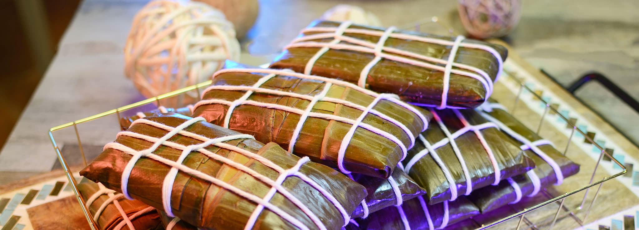 Artisan tamales — close-up of texture and leaves